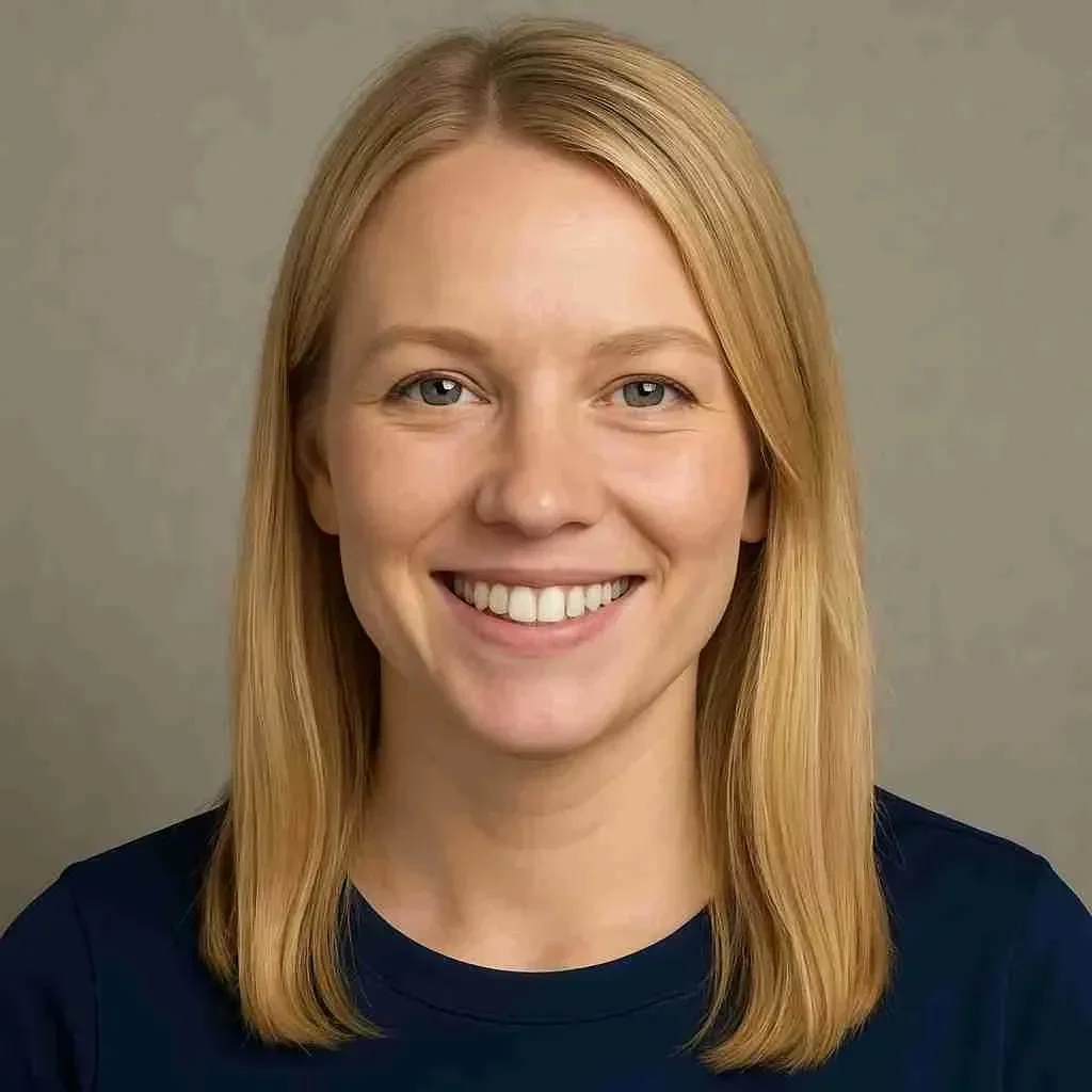 A profile photo of a Smiling Blonde girl